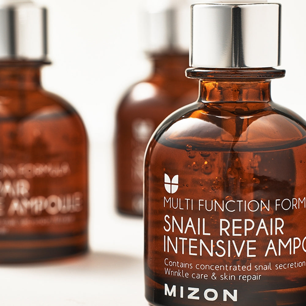 Mizon Snail repair intensive ampouleAtstatomasis serumas veido odai su sraigių mucinu
